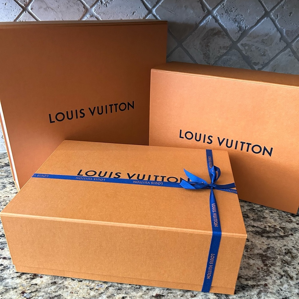 Louis Vuitton gift boxes & ribbon.